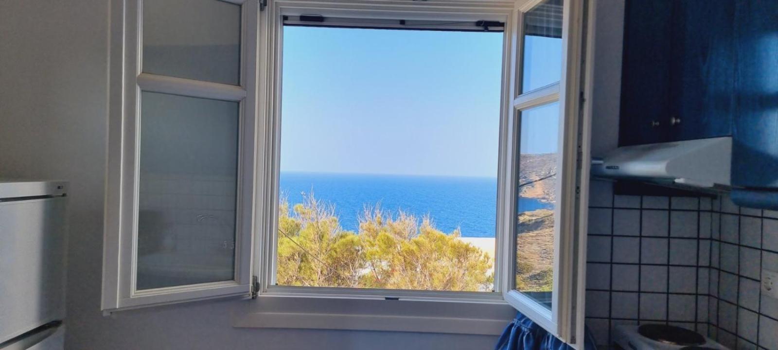 Syros Apartments Suites Chryssonisos Кинион Экстерьер фото