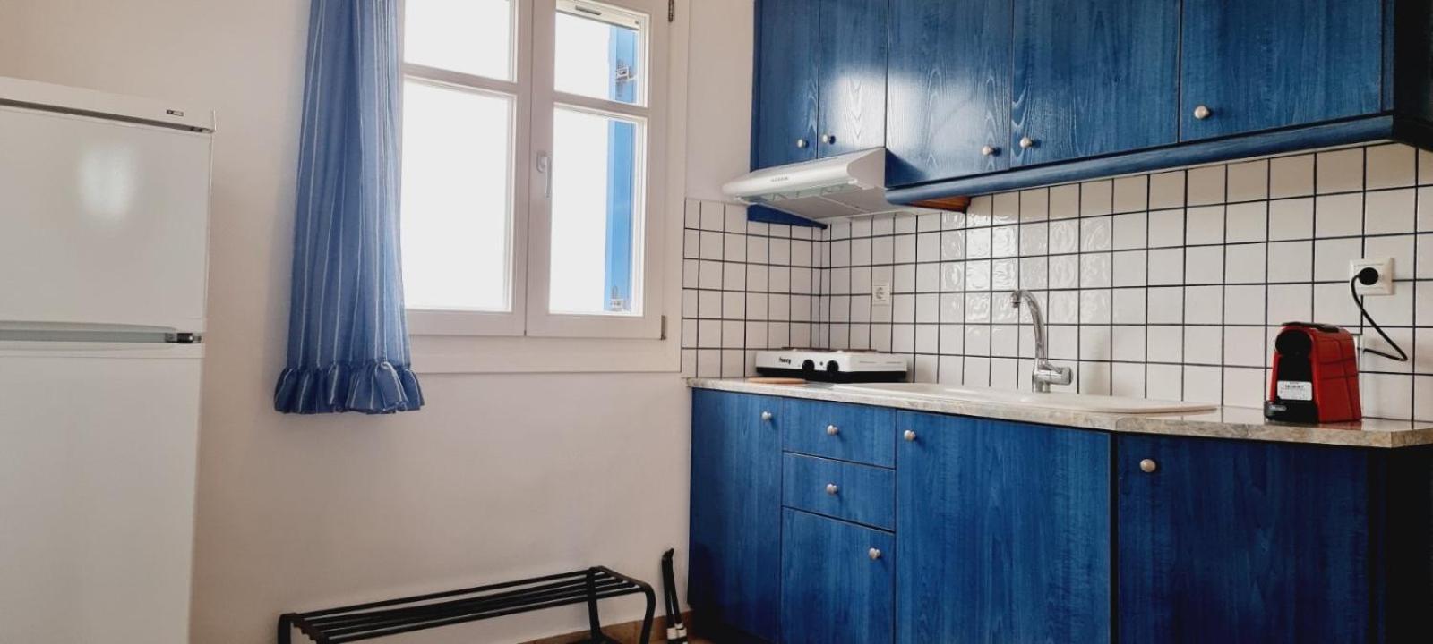 Syros Apartments Suites Chryssonisos Кинион Экстерьер фото